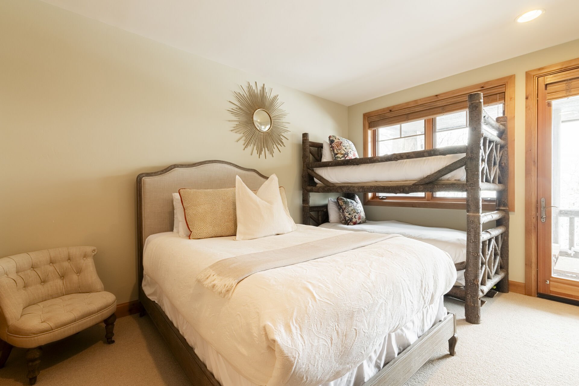 Bedroom 4 (1st Level) offers a queen bed and twin over twin bunk beds