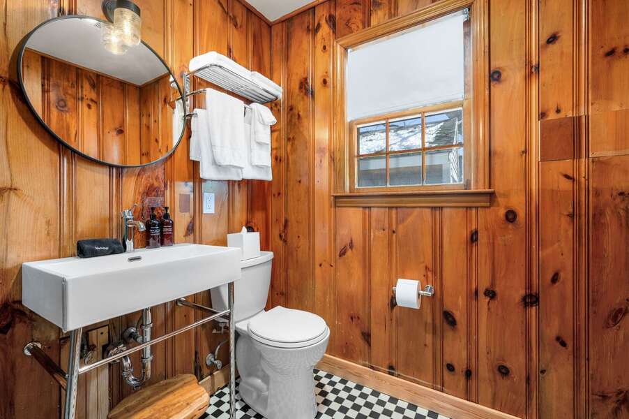 View of the bathroom from doorway including a stool to assist with the little ones! - 4 Manning Road Dennis Port Cape Cod - Blue Sky