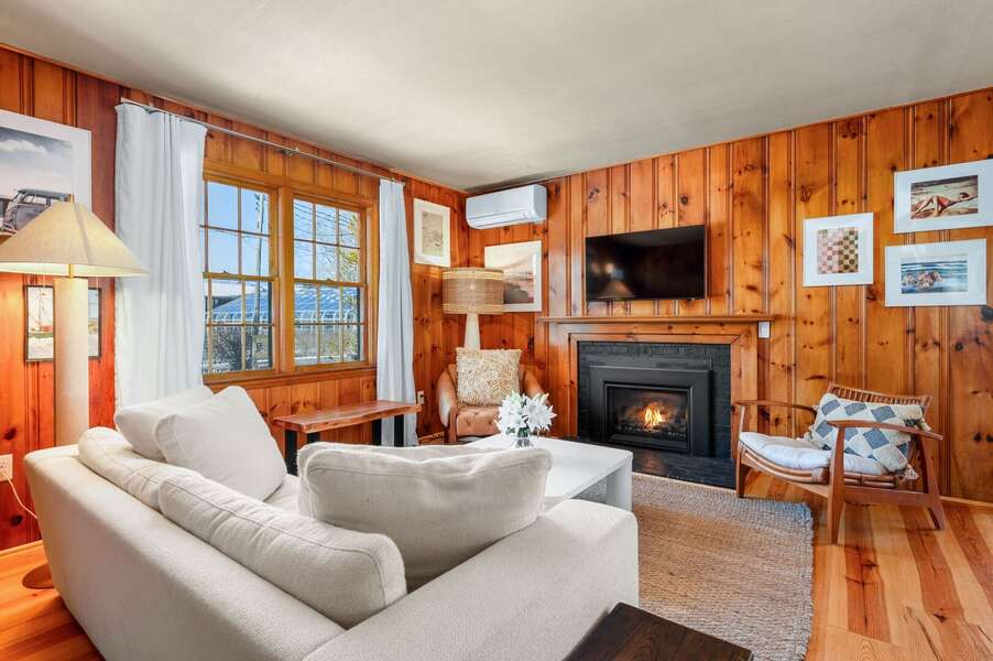 Comfortable living room with flat screen TV and fireplace to get cozy on cooler nights - 4 Manning Road Dennis Port Cape Cod - Blue Sky