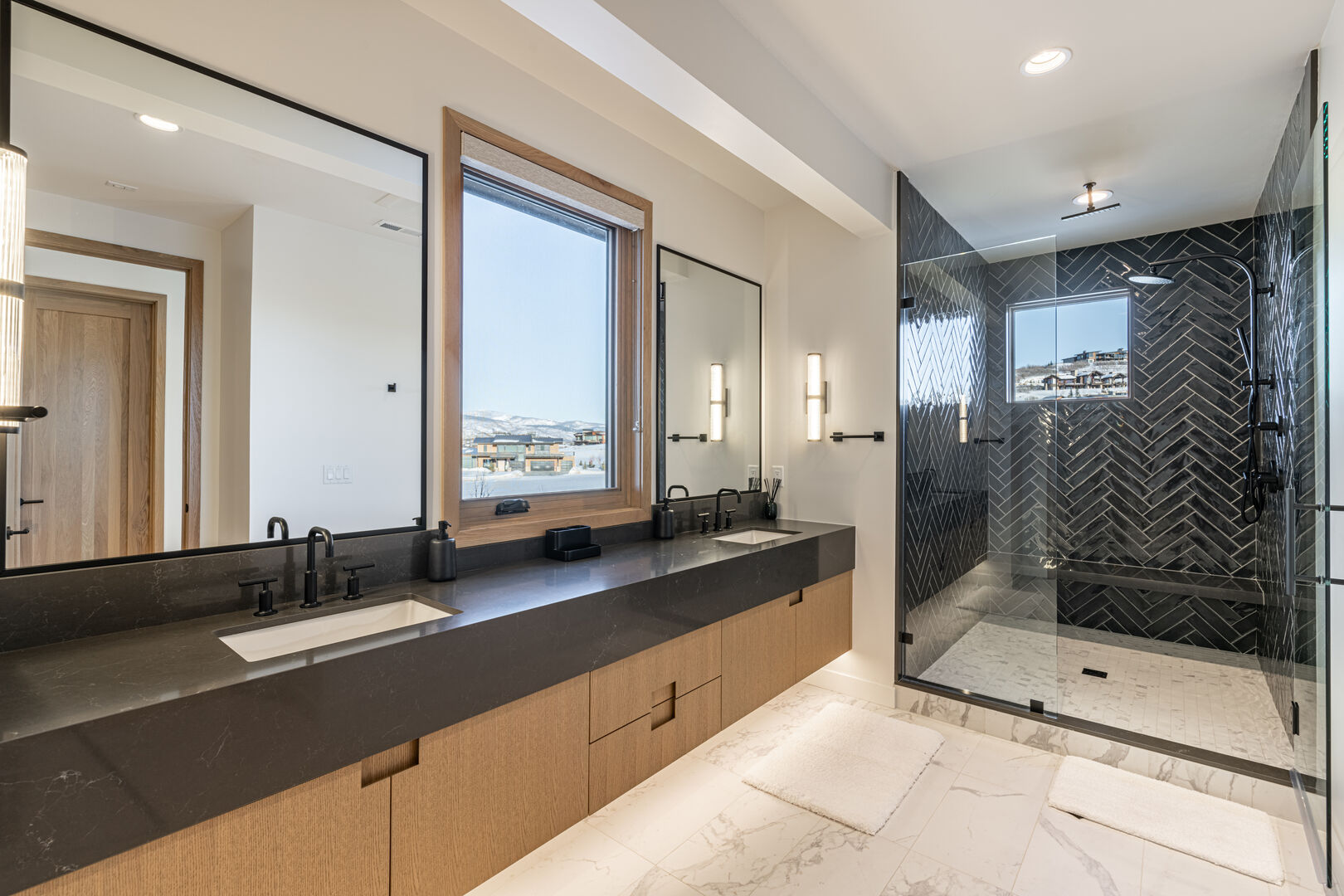 Double vanity and spacious shower.