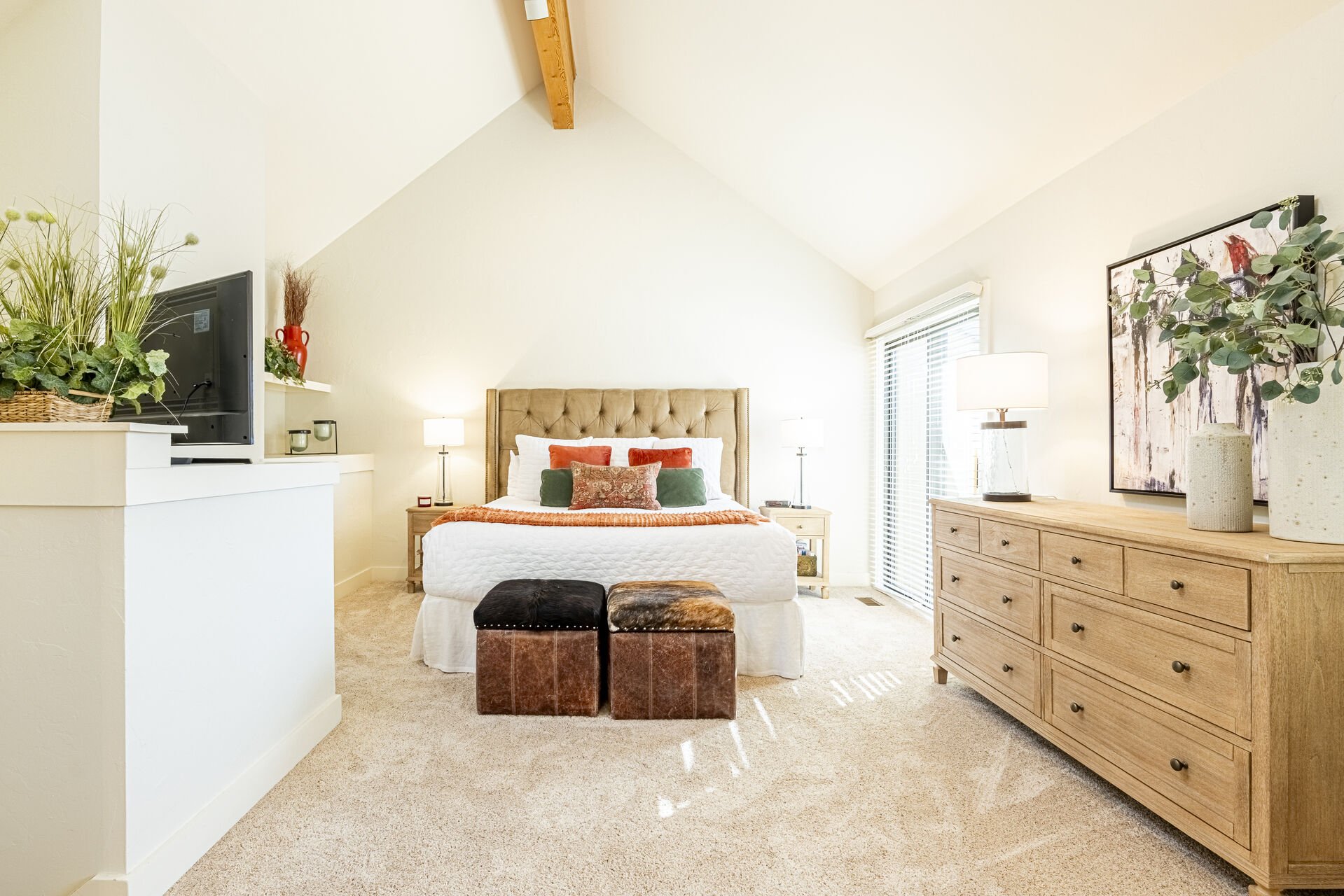 Master Bedroom - spacious 3rd level suite with a king bed and vaulted ceiling
