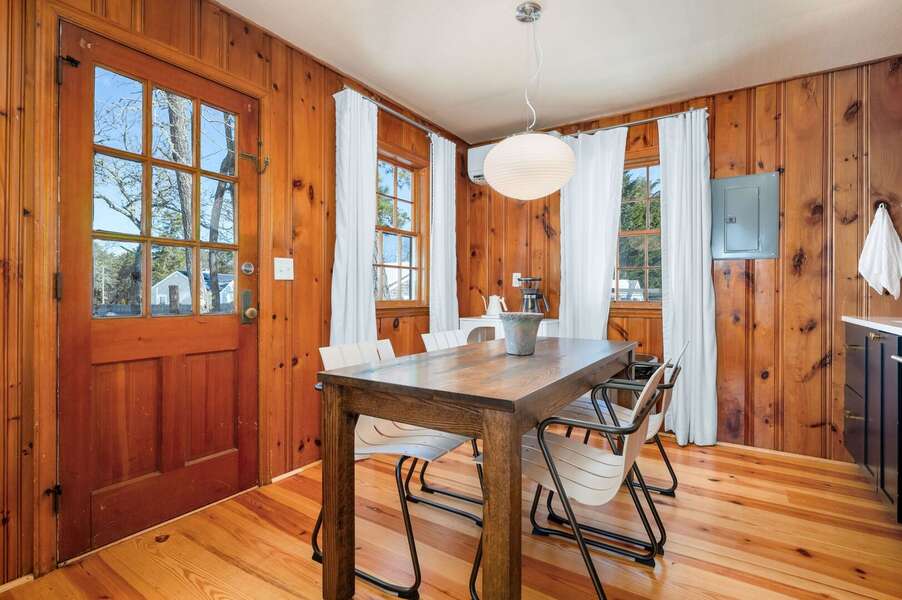 Convenient door leading to the Webber grill and patio with dining table - 6 Manning Road Dennis Port Cape Cod - Sweet Retreat