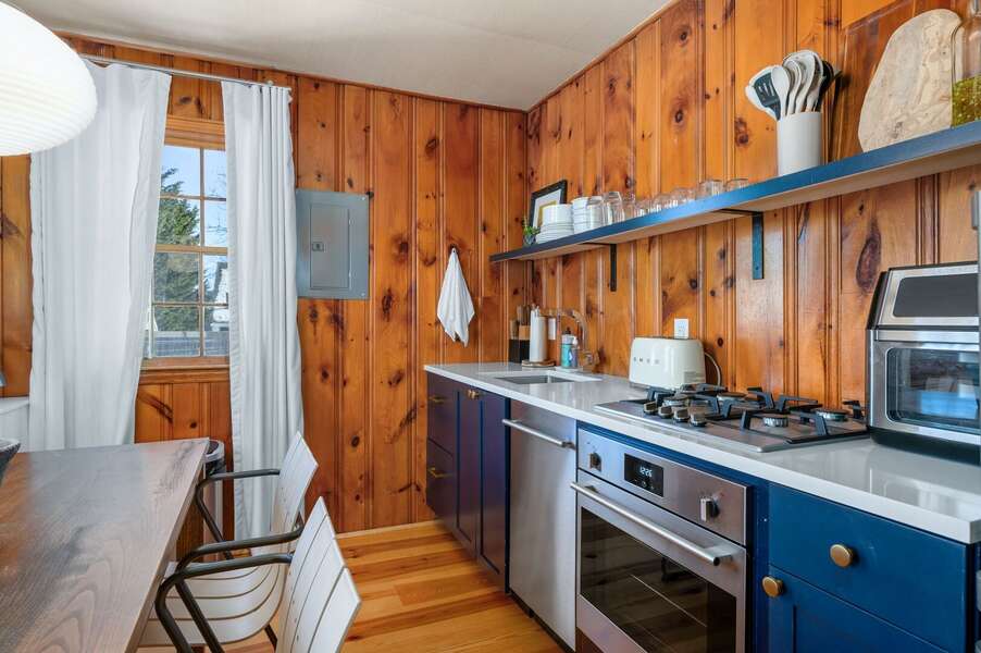 Conveniently prepare or serve meals from this open kitchen/dining space - 6 Manning Road Dennis Port Cape Cod - Sweet Retreat