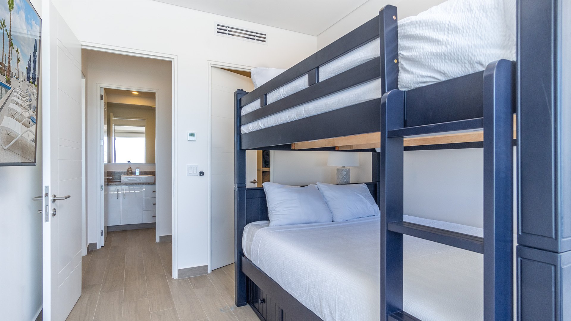 Bunk beds and the hall bathroom.