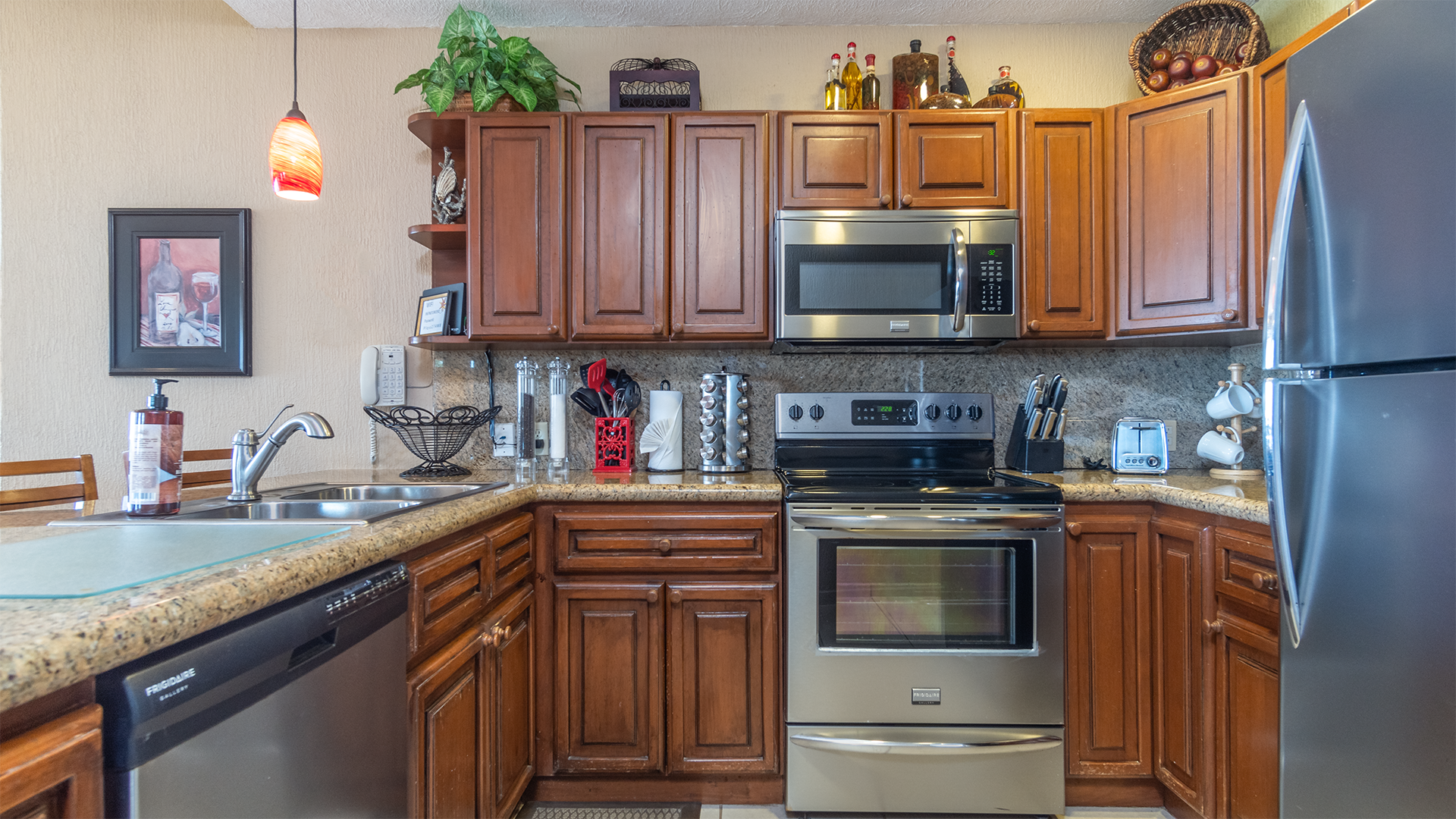 Fully Stocked Kitchen with Stainless Steel Appliances