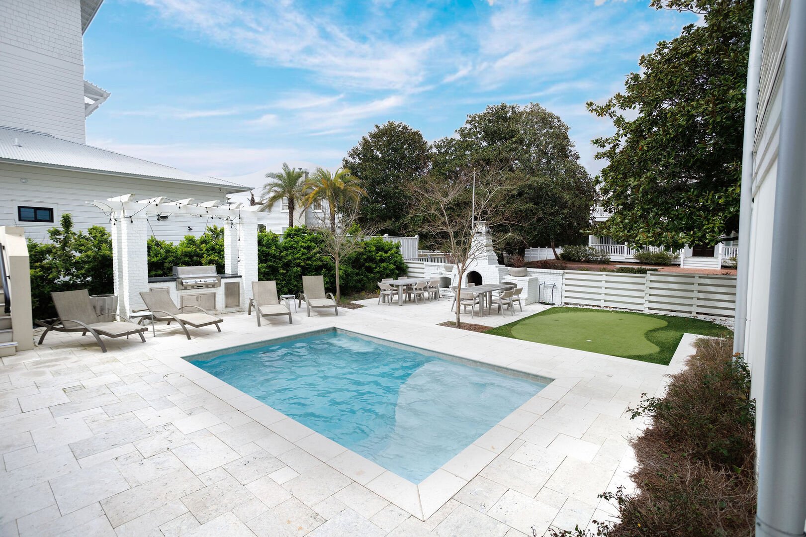 Backyard is perfect for entertaining with a heated pool!