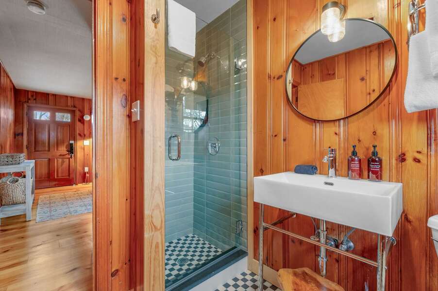 The tiled shower stall with glass door next to the vanity - 14 Manning Road Dennis Port Cape Cod - Sea