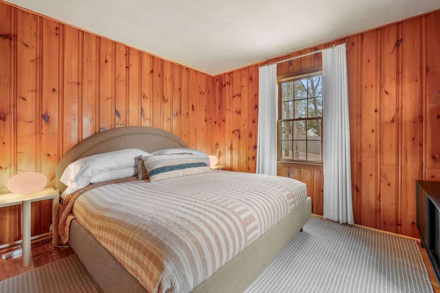 Bedroom 1 offers a king-sized bed with light serene decor - 18 Manning Road Dennis Port Cape Cod - Salt