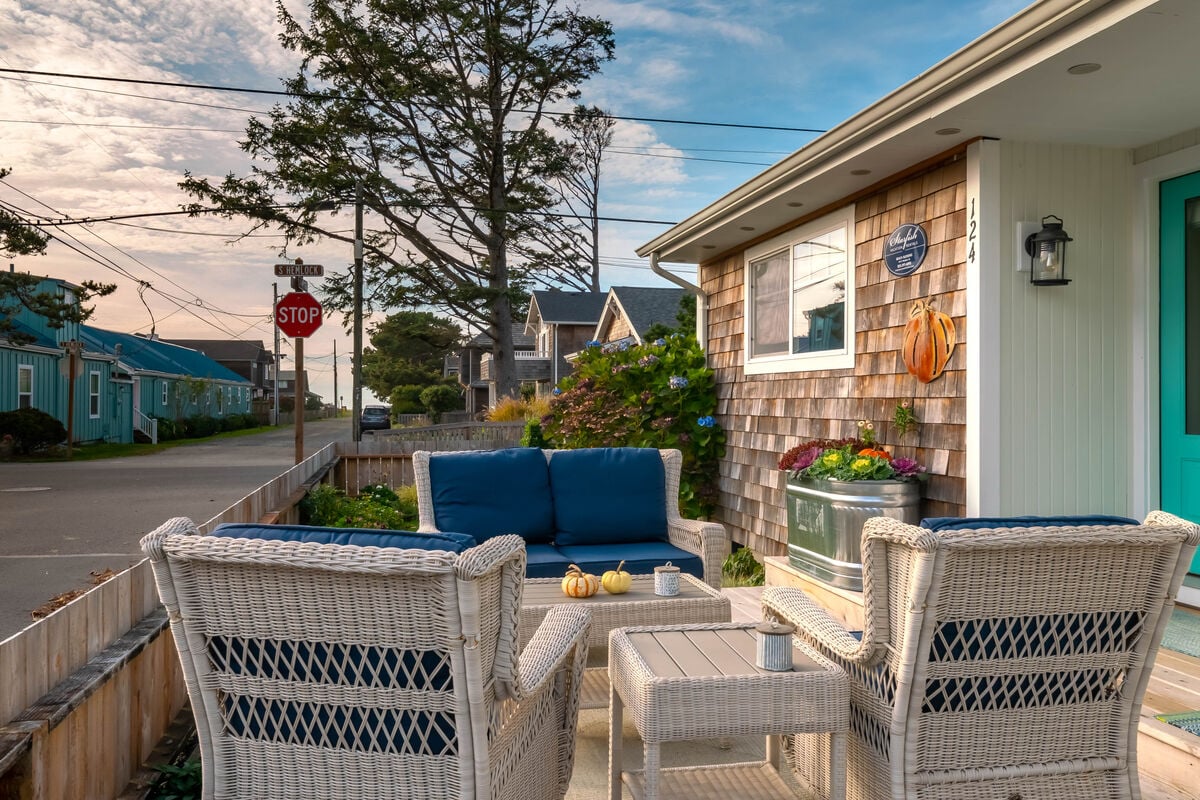 The cottage is perfectly positioned for enjoying a peek of the ocean from the spacious front deck.