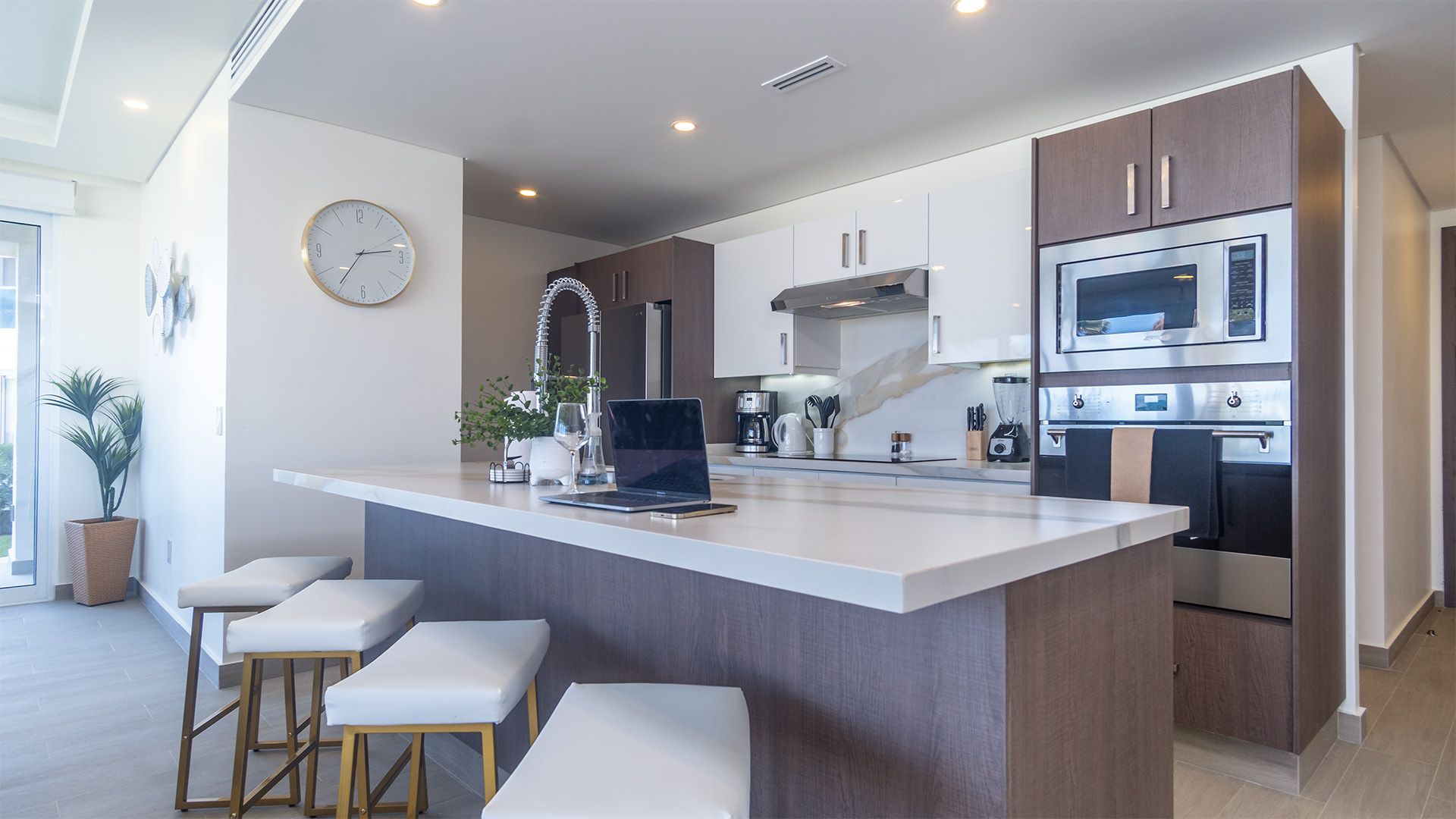 Seating at the kitchen counter, a great spot to check emails!