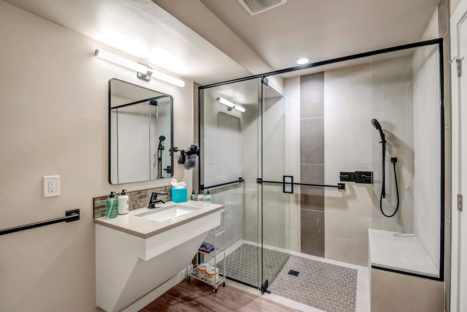 Master bathroom with single vanity and large walk-in shower