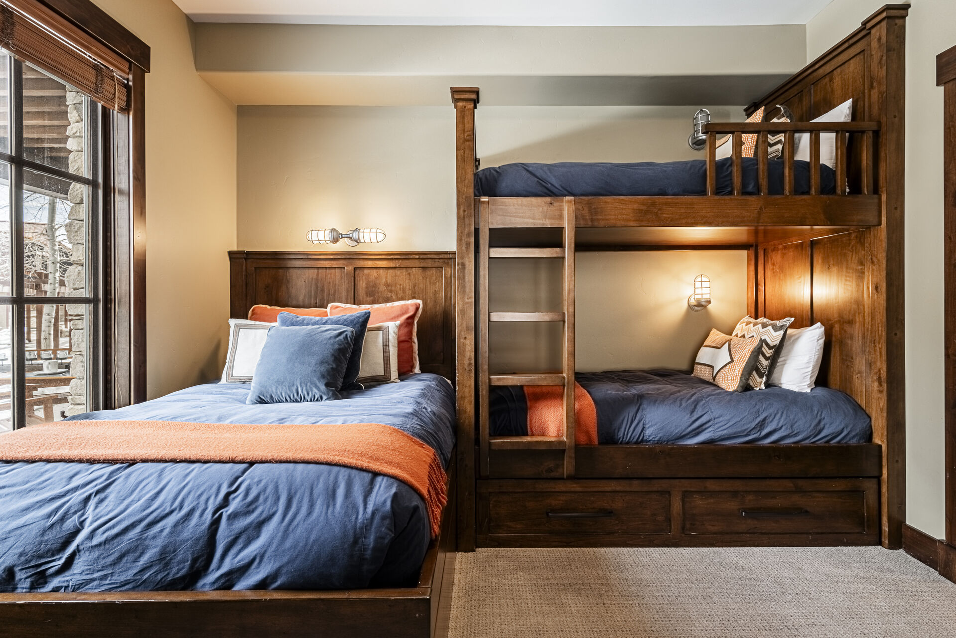 Twin over twin bunk beds with a twin trundle and a full-size bed