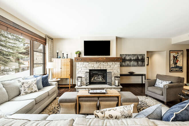 Cozy living area with a gas fireplace and Smart TV