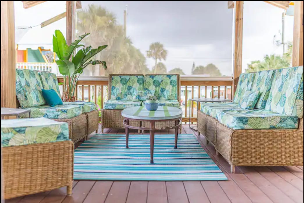 Upstairs Accommodations Includes Deck With Wonderful Breeze, Lots of Outdoor Seating and a TV for those who enjoy sports, movies, or their favorite shows away from home.