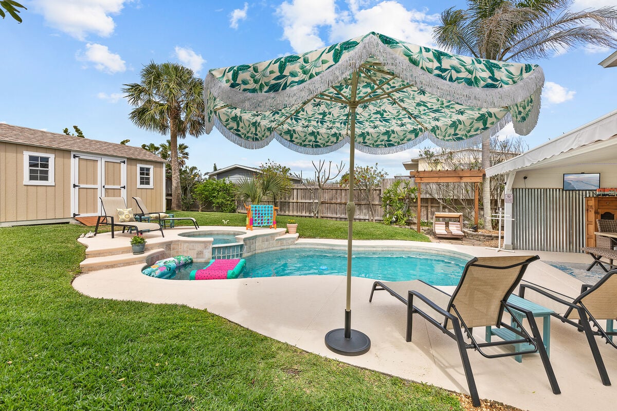 Relax in your private oasis with tons of seating, heated pool, and hot tub.