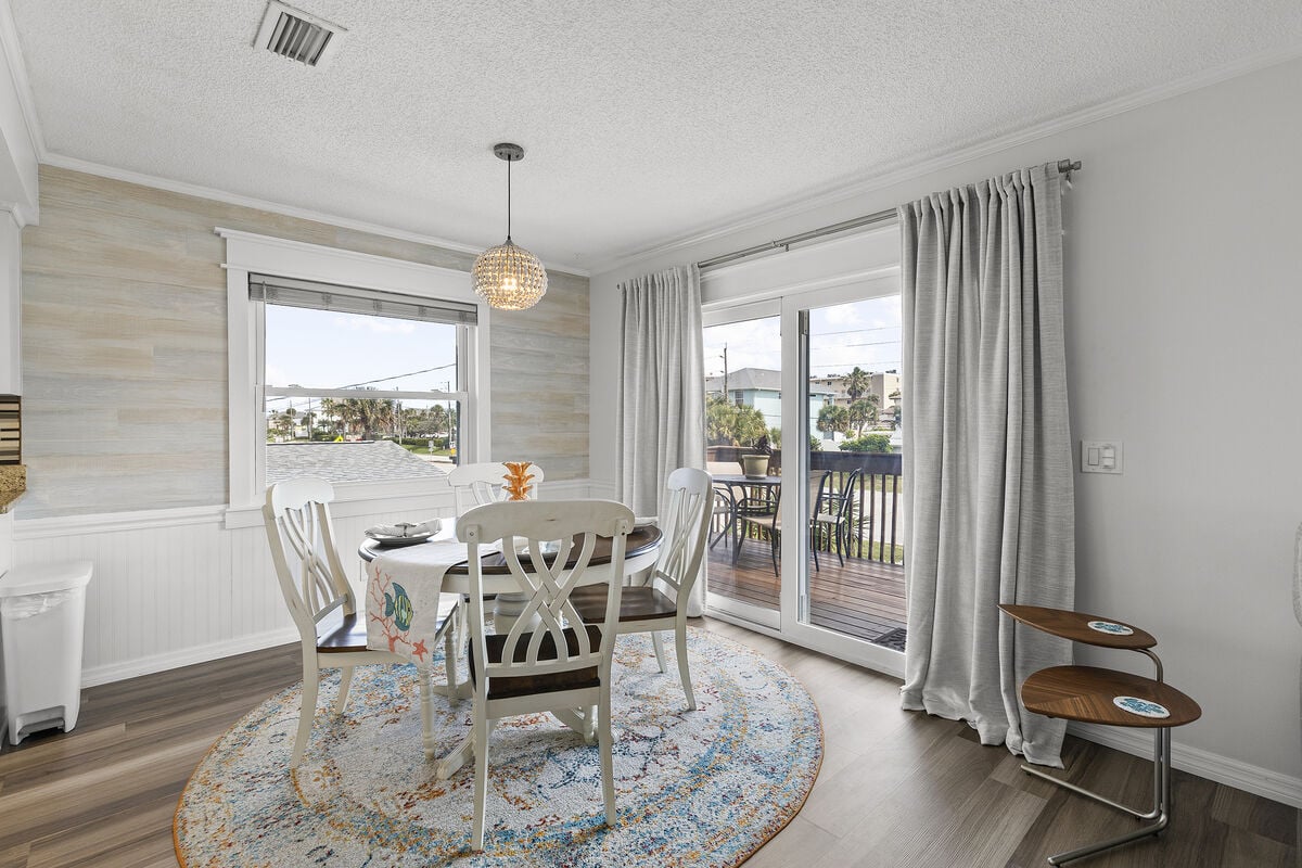 Savor every moment in this bright and airy dining nook, positioned adjacent to the kitchen and living area. It's a perfect setting for intimate meals or leisurely brunches, the balcony just beyond offers a refreshing outdoor escape.