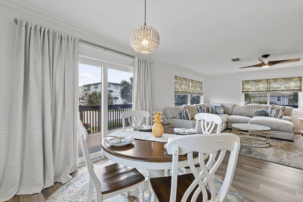 Dine in style in this sun-soaked space, adjacent to kitchen and living areas. Seats 4, with balcony access for al fresco dining.