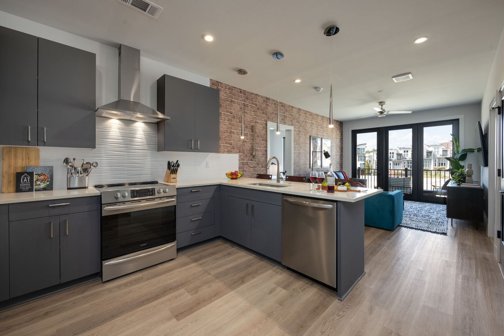 Unit 2: Experience the joy of cooking in a fully equipped kitchen with top-tier stainless steel appliances, sleek granite countertops, and cozy breakfast bar seating.