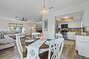 Step into a bright dining oasis by the kitchen and living area, seating 4 comfortably. Perfect for casual meals or chats.