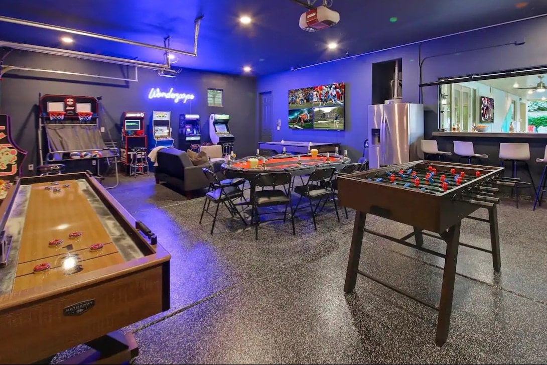 Epic inside outside game room!
Shuffleboard, foosball, 4 tvs, 8 person poker table, basketball, arcade games and air hockey table!