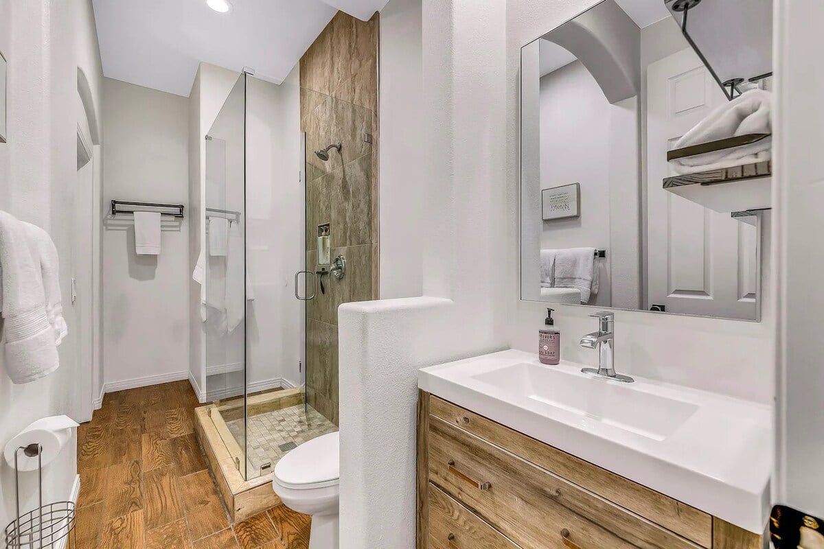 En-suite bathroom connected to king sized bedroom