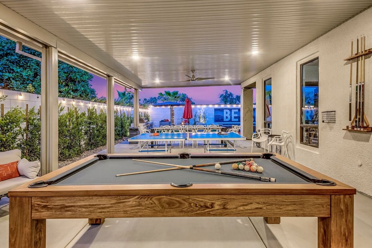 Ping pong!
Pool table!! 
Outdoor table seating for 16 people!