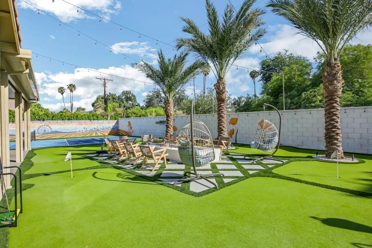 Four hole mini golf course/putting green surrounding a 12 person firepit