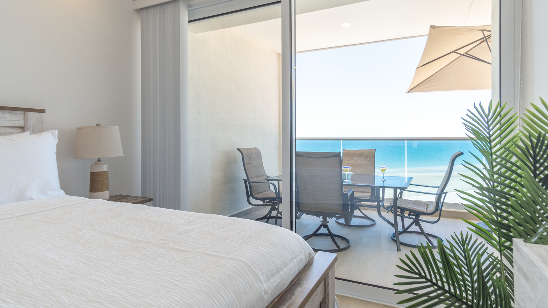 The grand dining table is right outside of the main bedroom
