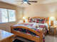 Enjoy the comfortable king-size bed in the master bedroom