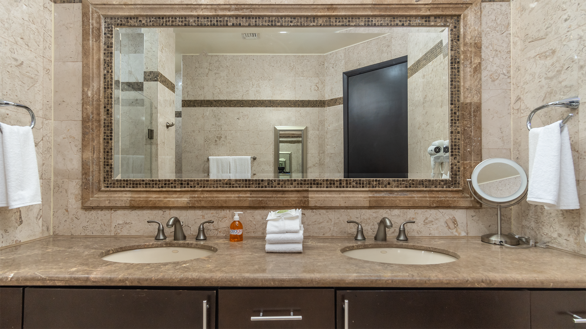 Double sink vanity and large mirror.