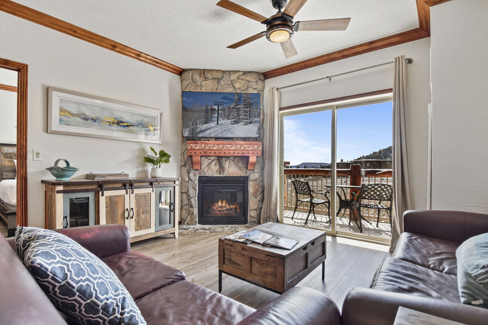 Gas fireplace and flatscreen TV.