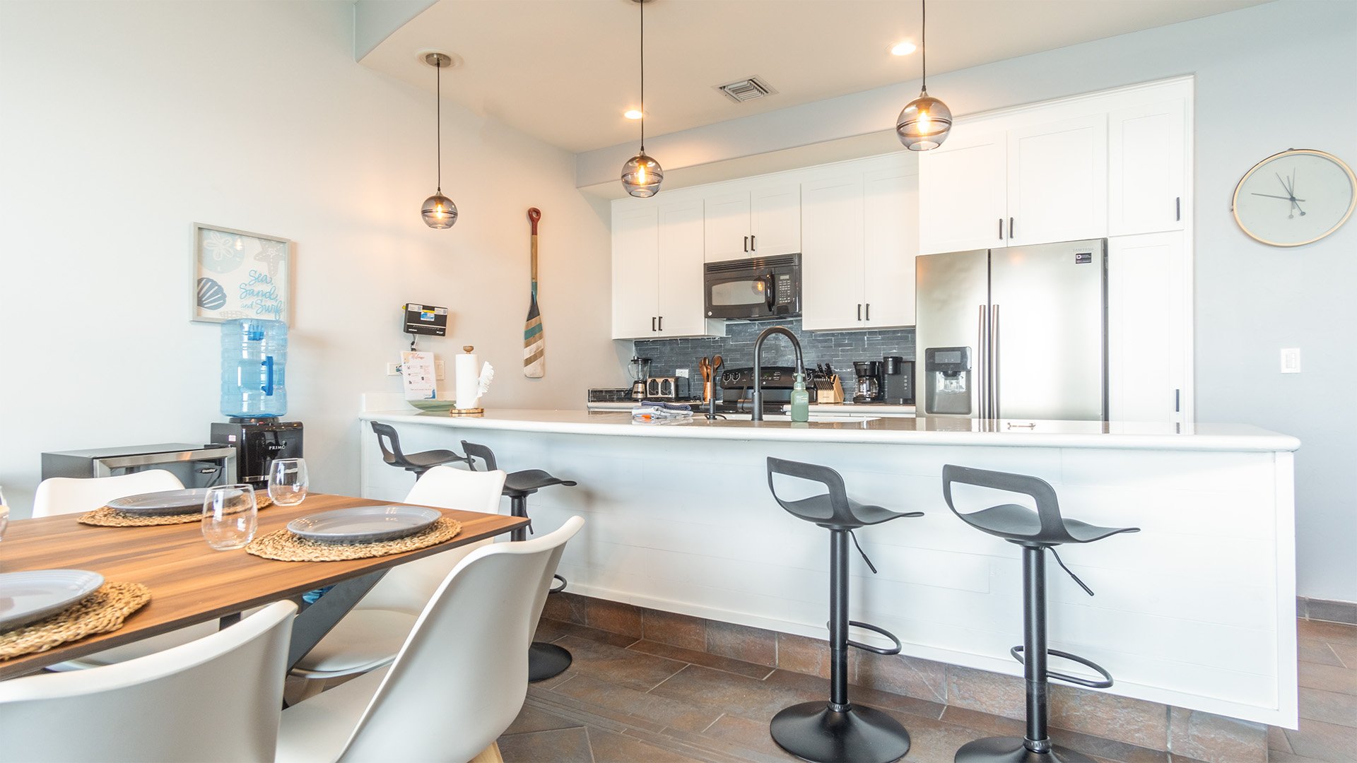 Bar stools at the kitchen counter.