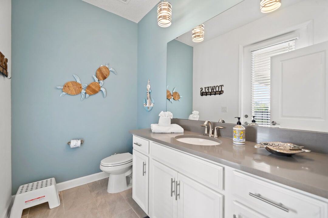 Half bathroom with patio/pool access