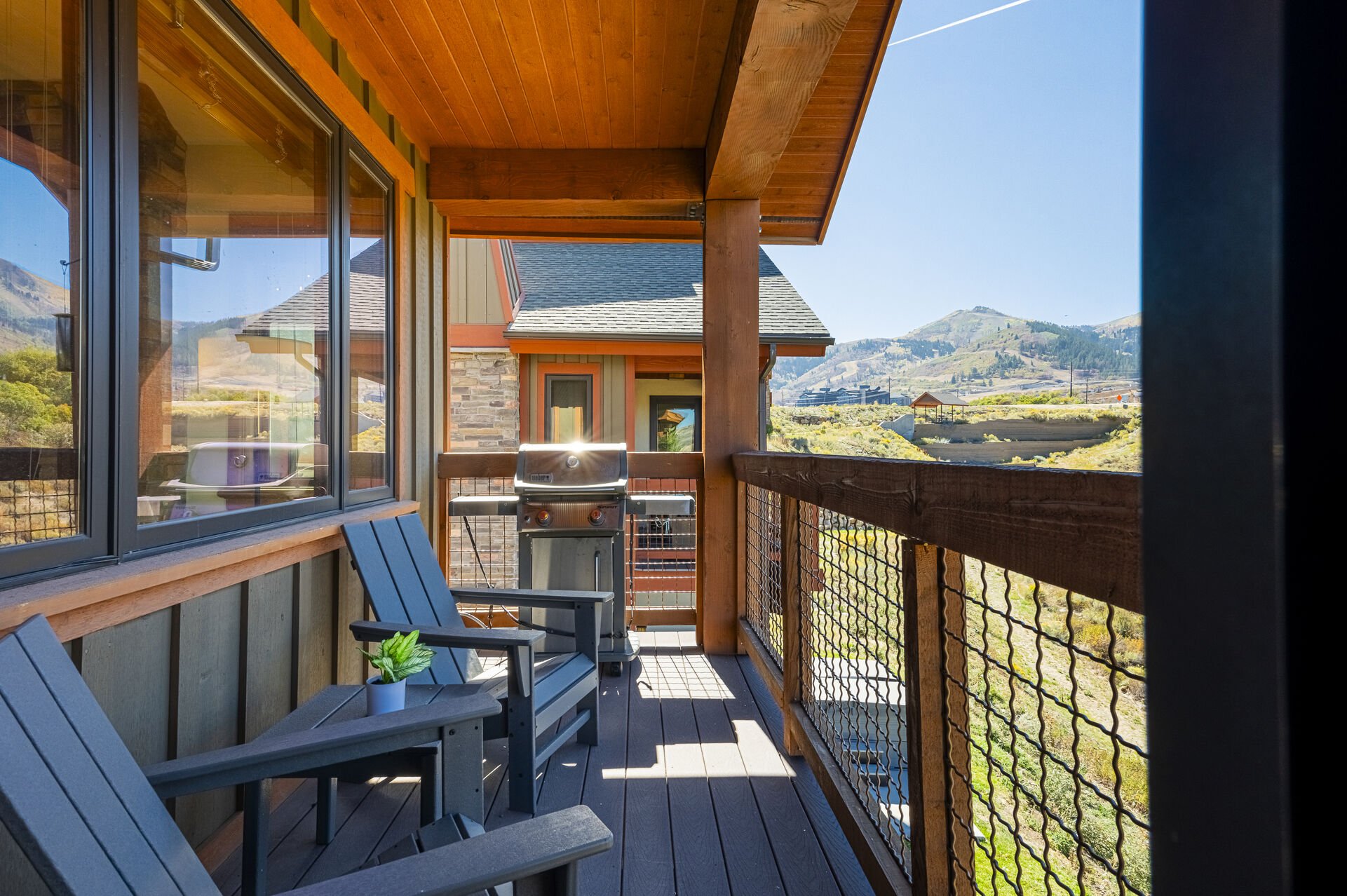 Main level deck with a gas BBQ and mountain views Main level deck with a gas BBQ and mountain views