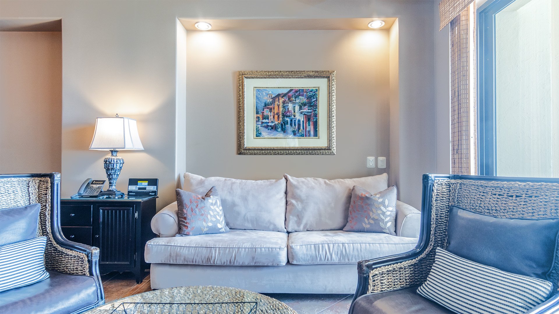 Classy and comfortable, the living room exudes charm.