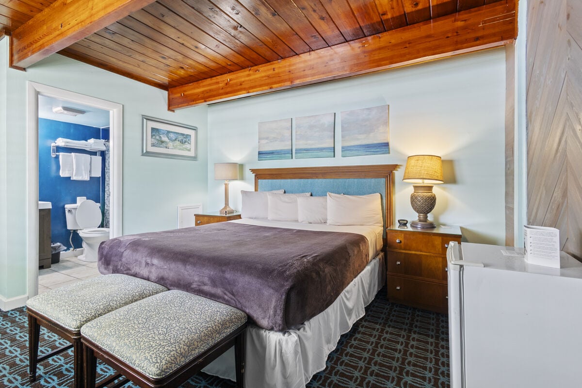 Room 9 is located on the third floor of the Inlet Building. It has a king-size bed and a window overlooking the inlet park.
