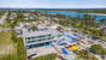 The property has three buildings with various room types and an onsite restaurant with indoor and outdoor seating options.