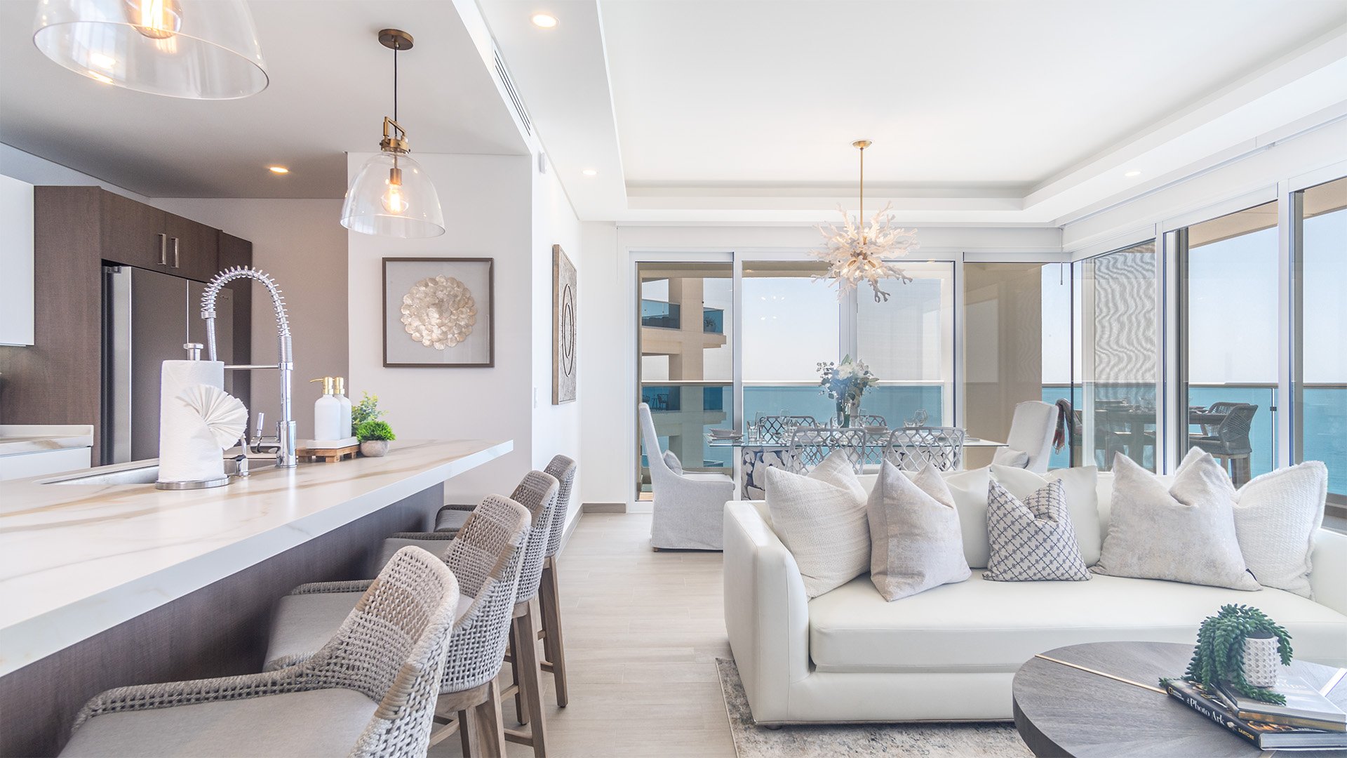 The main room is home to the living room. kitchen, and dining area.