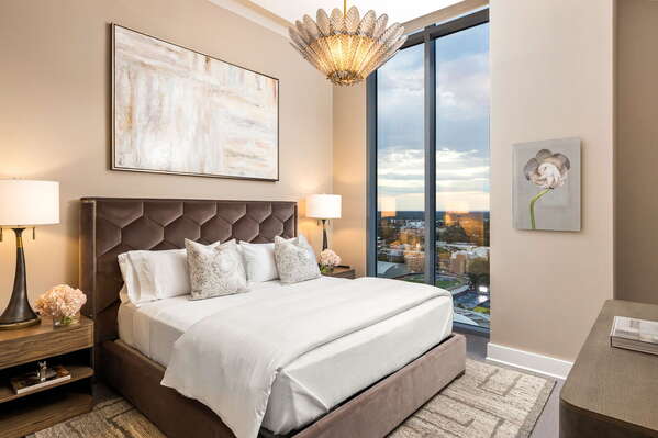 Primary suite with a king bed and a 55 4K UHD TV