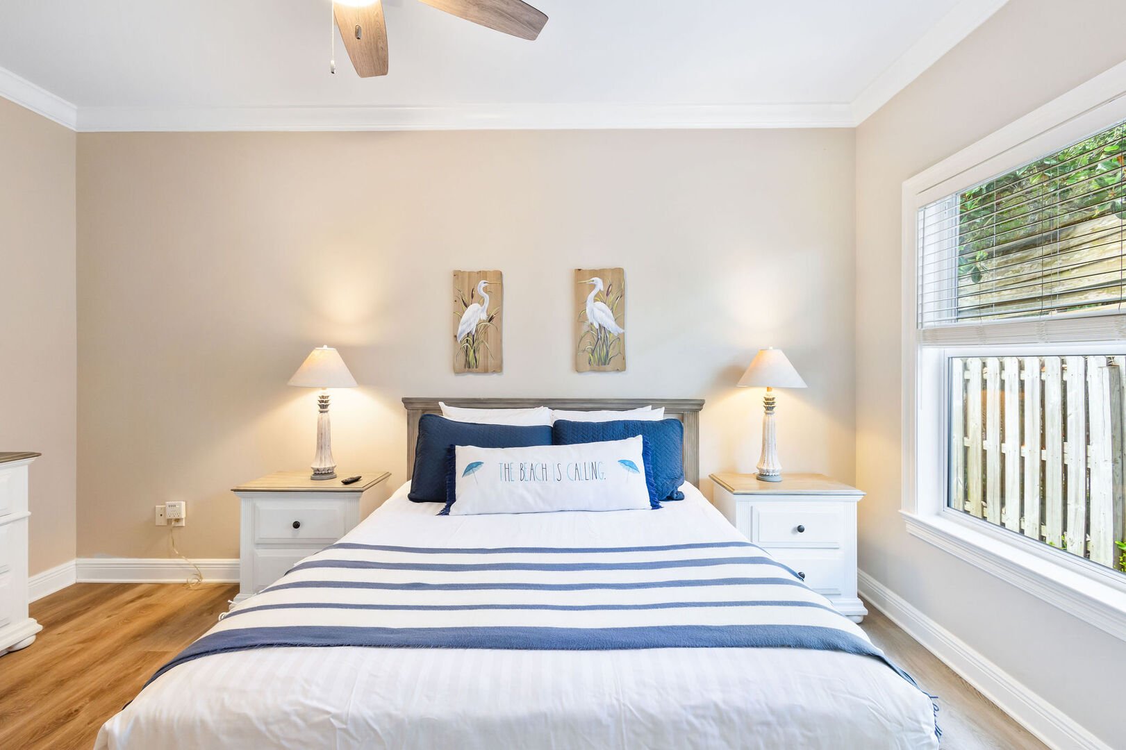 Bedroom #2 features a queen bed and smart tv.