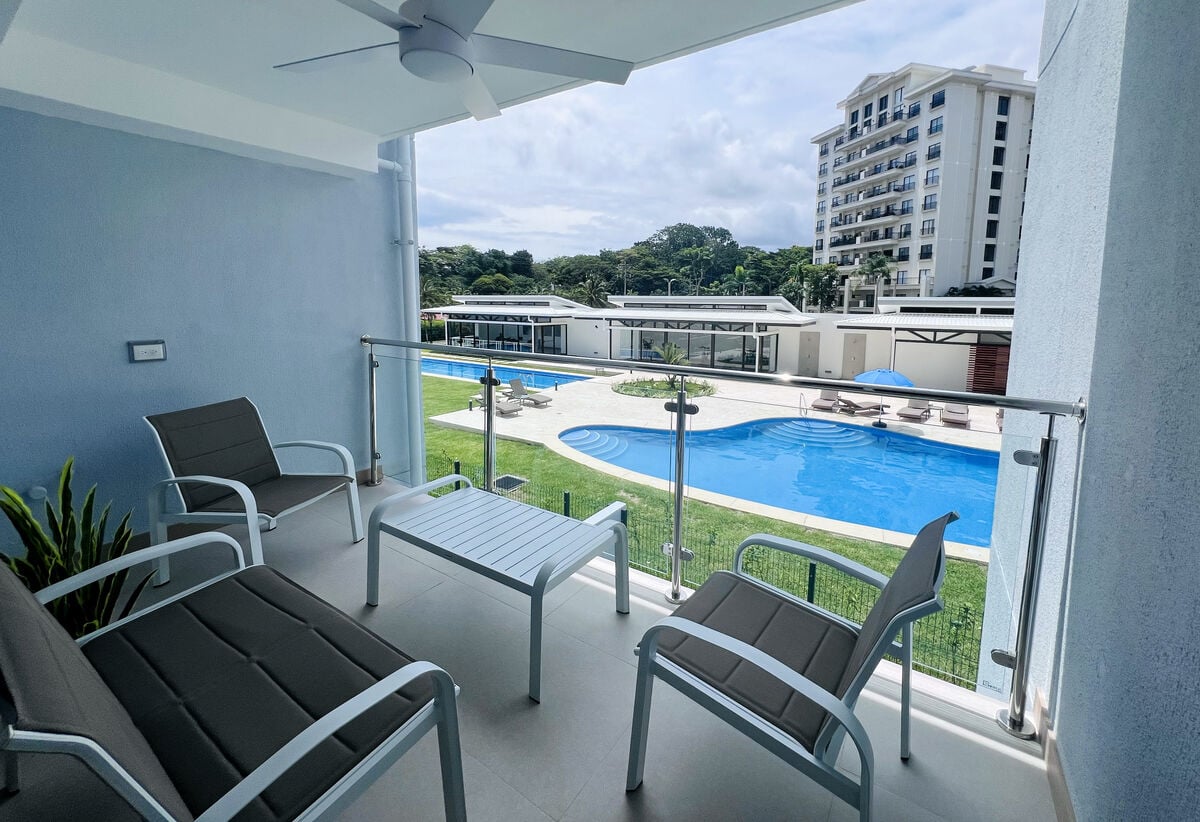 Enjoy beachside living with top amenities: pool, BBQ, and a coworking space