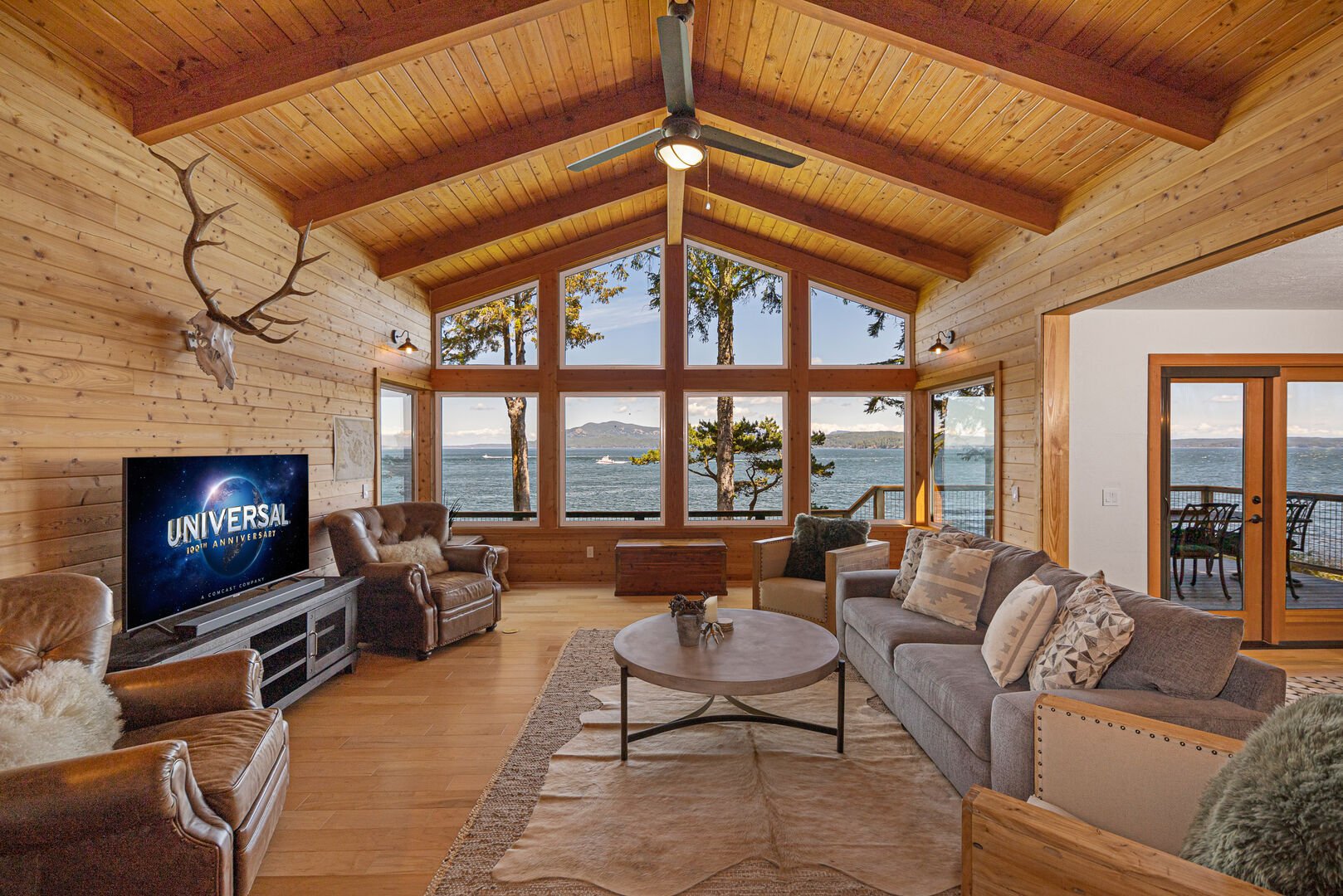 Main living area with tv and views
