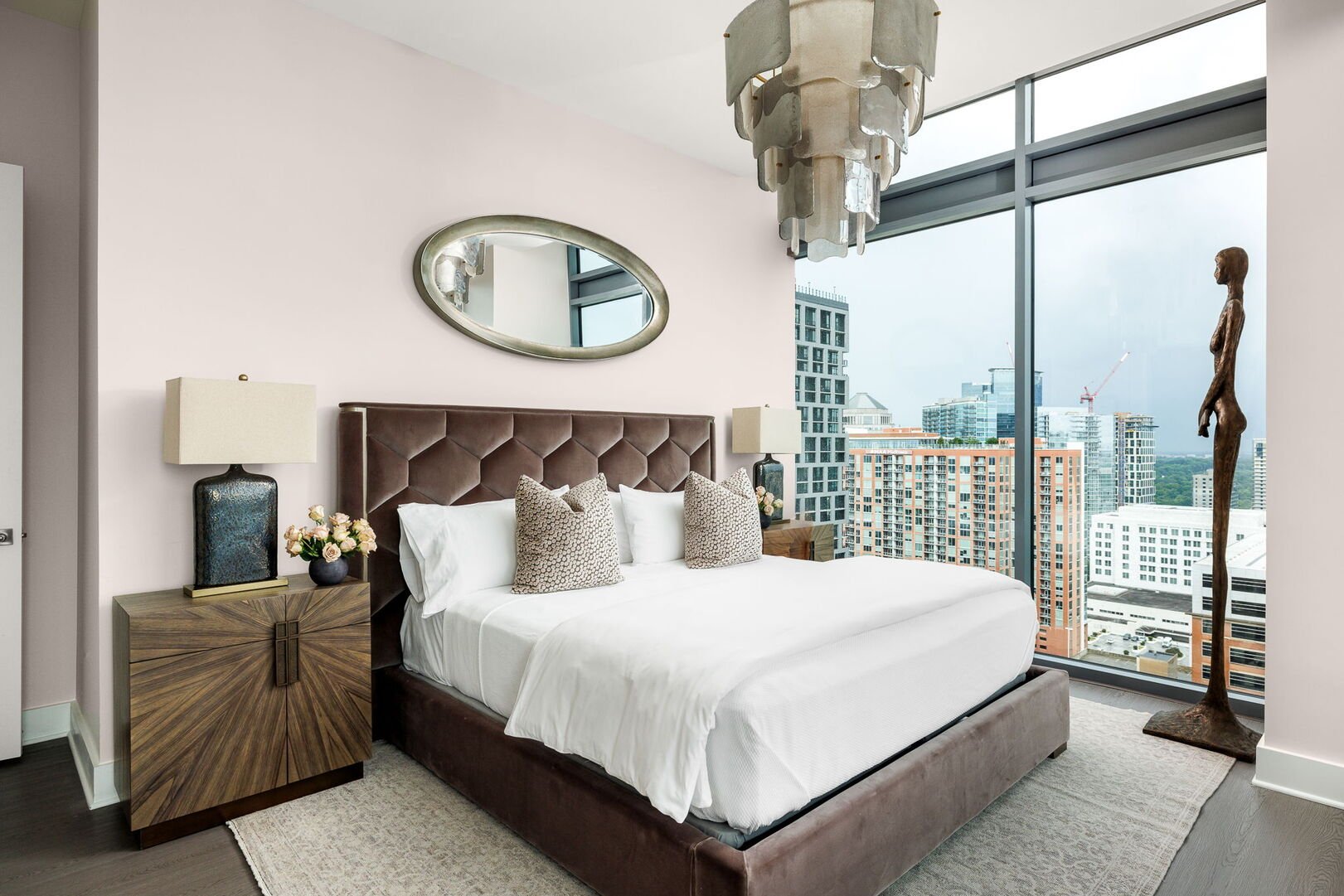Primary suite with a king bed and a 55 Primary suite with a king bed and a 55