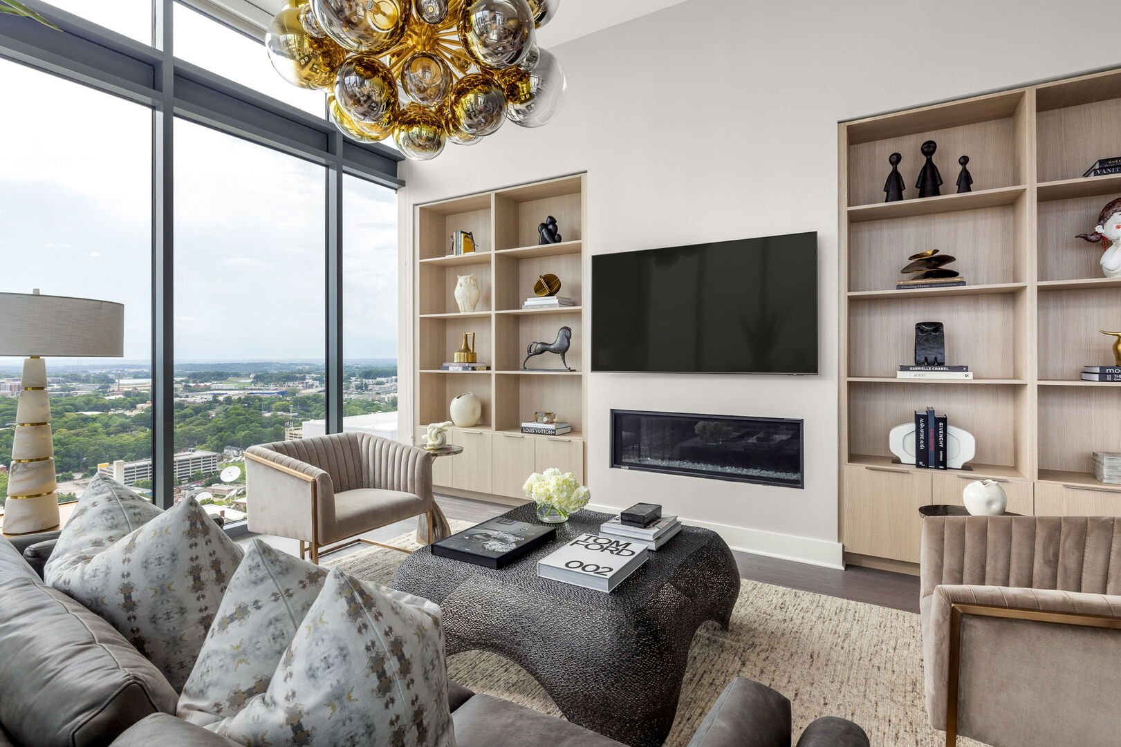 Living room featuring a 65 Living room featuring a 65
