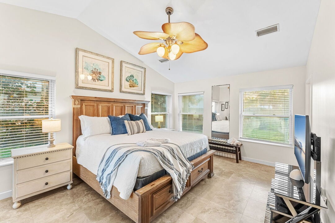 Main house master bedroom, featuring a luxurious king bed for ultimate comfort and relaxation.