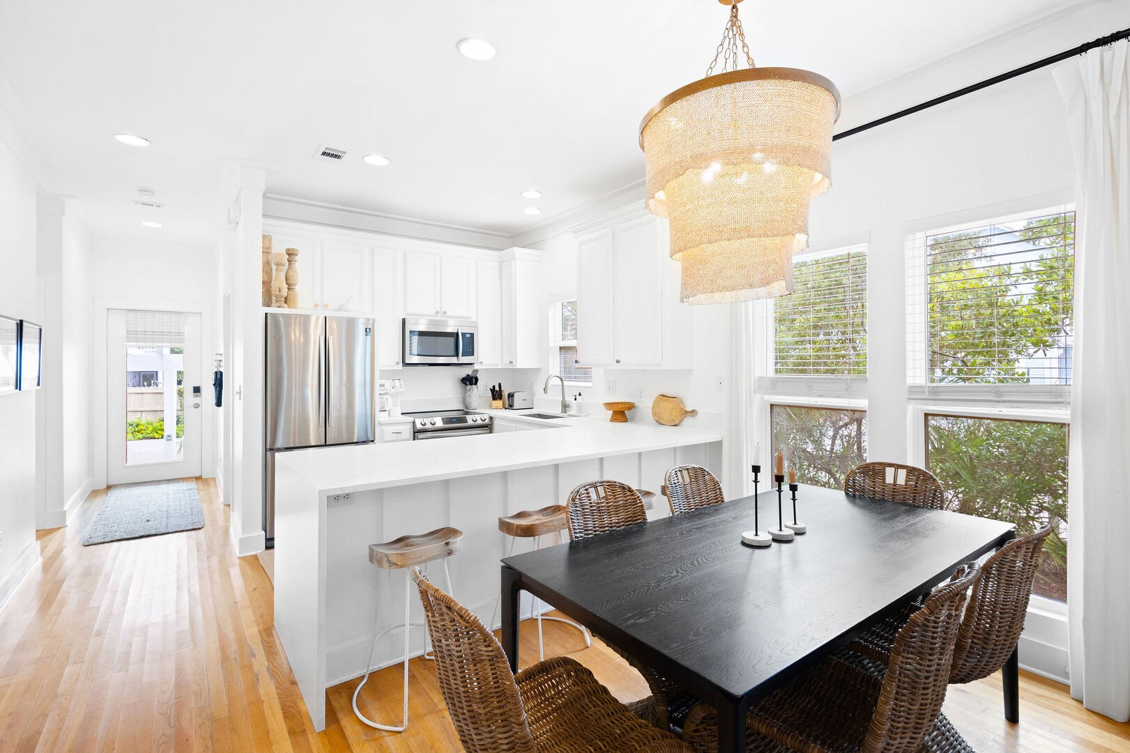 Large kitchen island includes seating for 4.