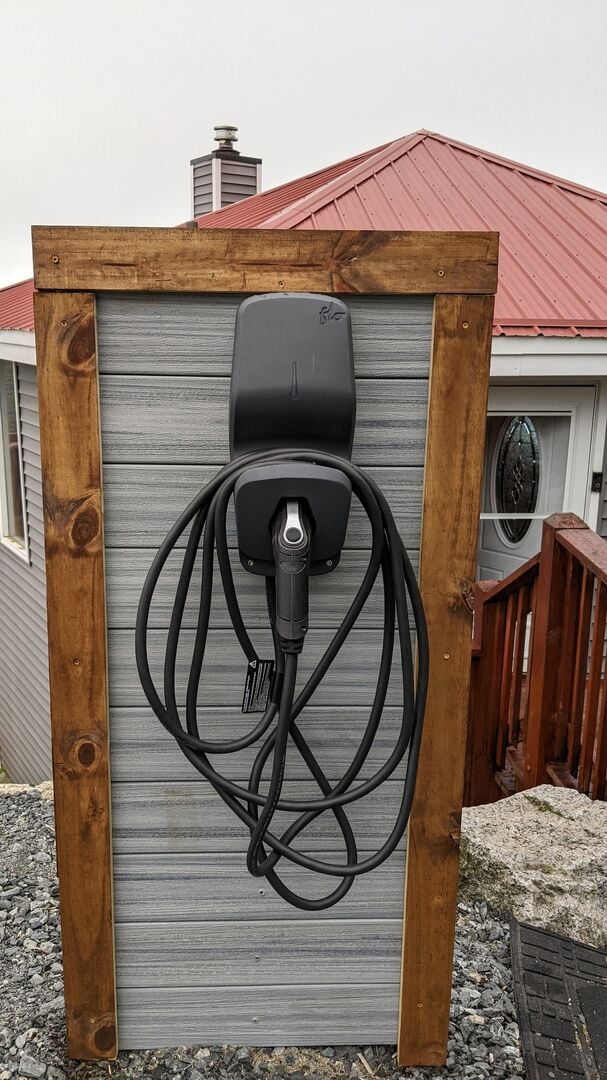 Flo Level 2 EV Charger (Universally Compatible - SAE J1772 connector); long cord for your convenience. Electric vehicles welcome! :)