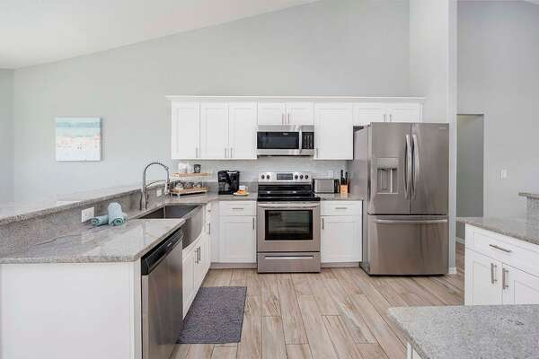 Open Kitchen with Stainless Appliances