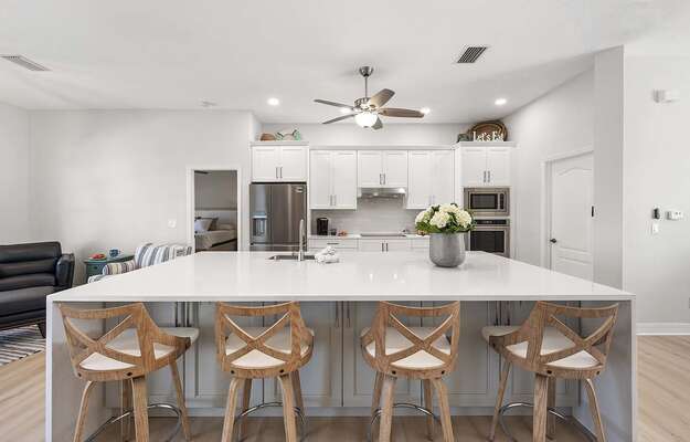 Large Center Island Offers Additional Seating Options