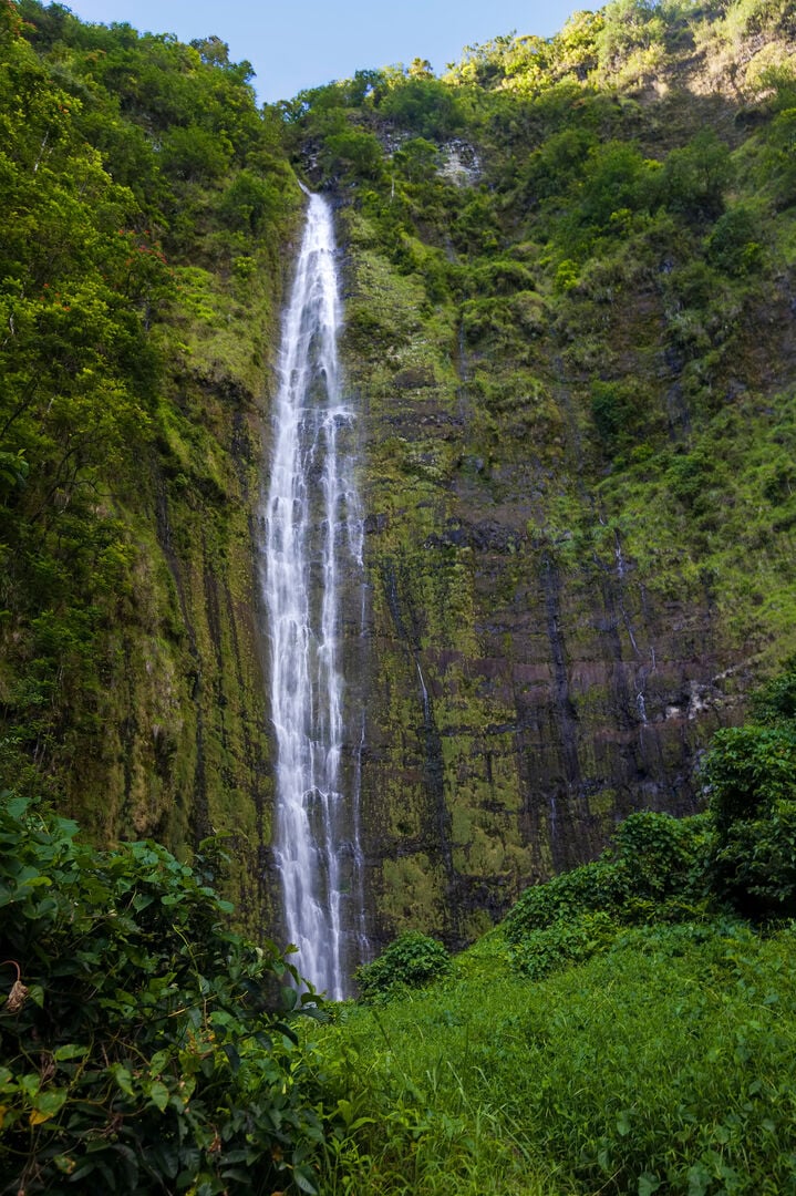 Stand in awe of Maui's majestic waterfalls, a true paradise for adventurers and photographers seeking nature's wonders.
